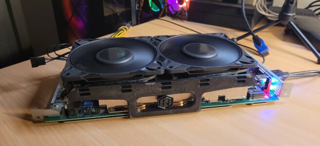 AMD BC-250 fitted with two fans and 3D-printed supports